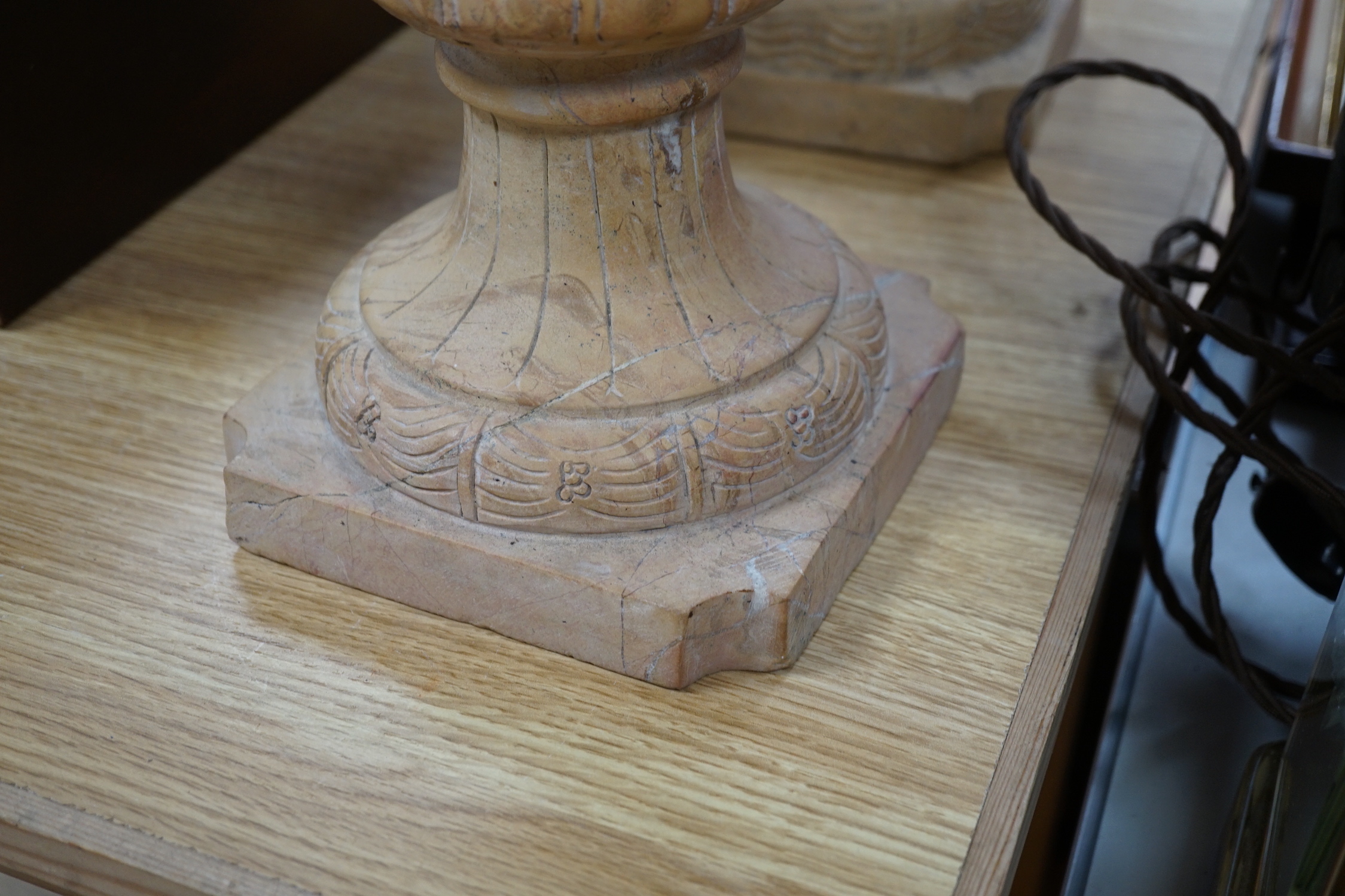 A large pair of Italian carved hardstone finial urns, 59cm